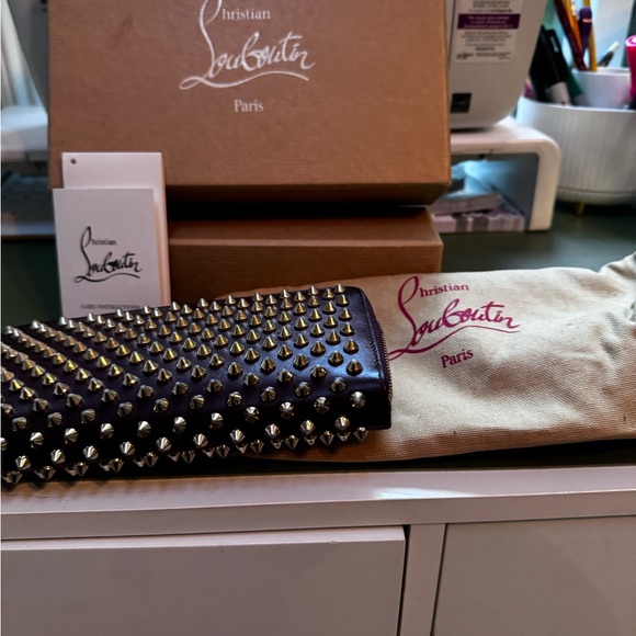 Christian Louboutin brown with pink spikes wallet. Great pre owned condition. - Picture 2 of 4